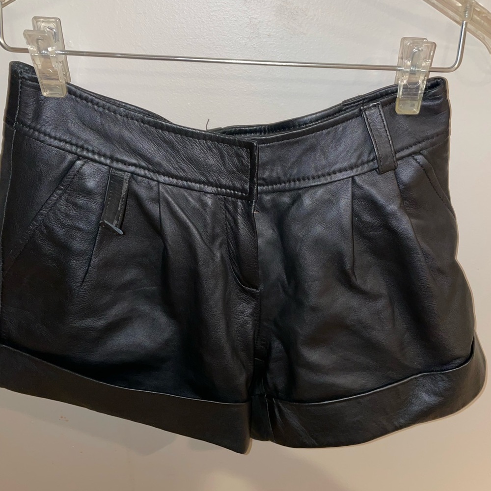 Never worn.   Real Leather shorts